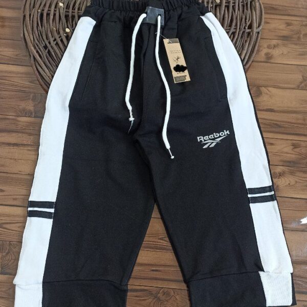 شلوارک پنبه گلکسی تو خونه‌ای مشکی خط دار سفید بزرگسال، دخترانه و پسرانه